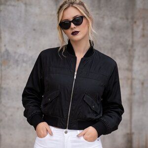 Medium DKNY long sleeve black bomber jacket with pockets and zipper close. NWT